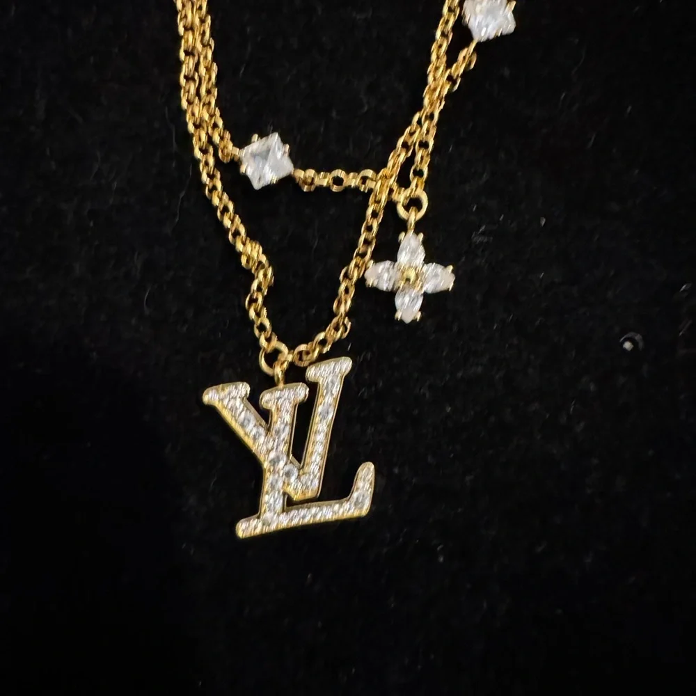 Louis Vuitton Gold and Silver Bracelet with Logo Charms - Picture 2 of 5